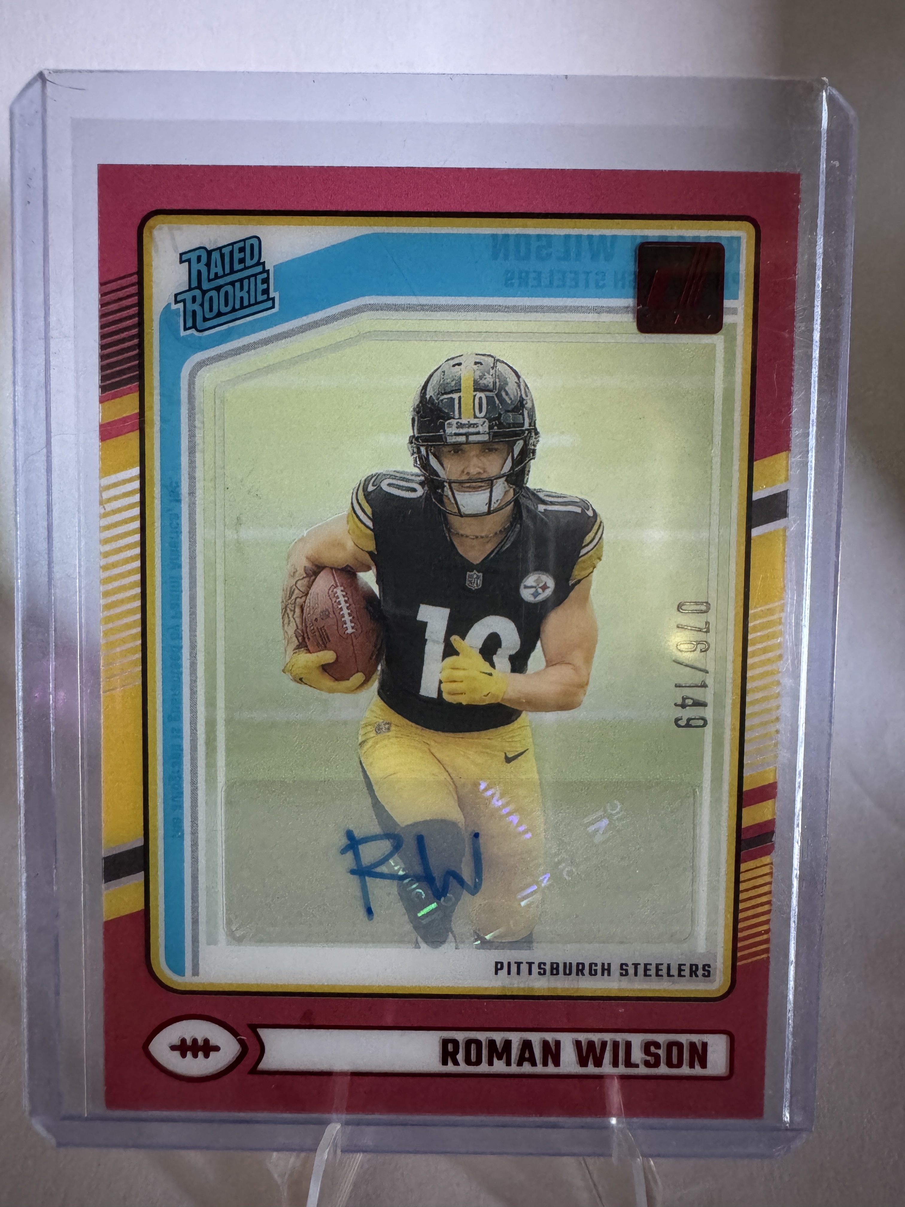 2024 Panini Clearly Donruss Football Roman Wilson #77 Red, Raw, front of the card