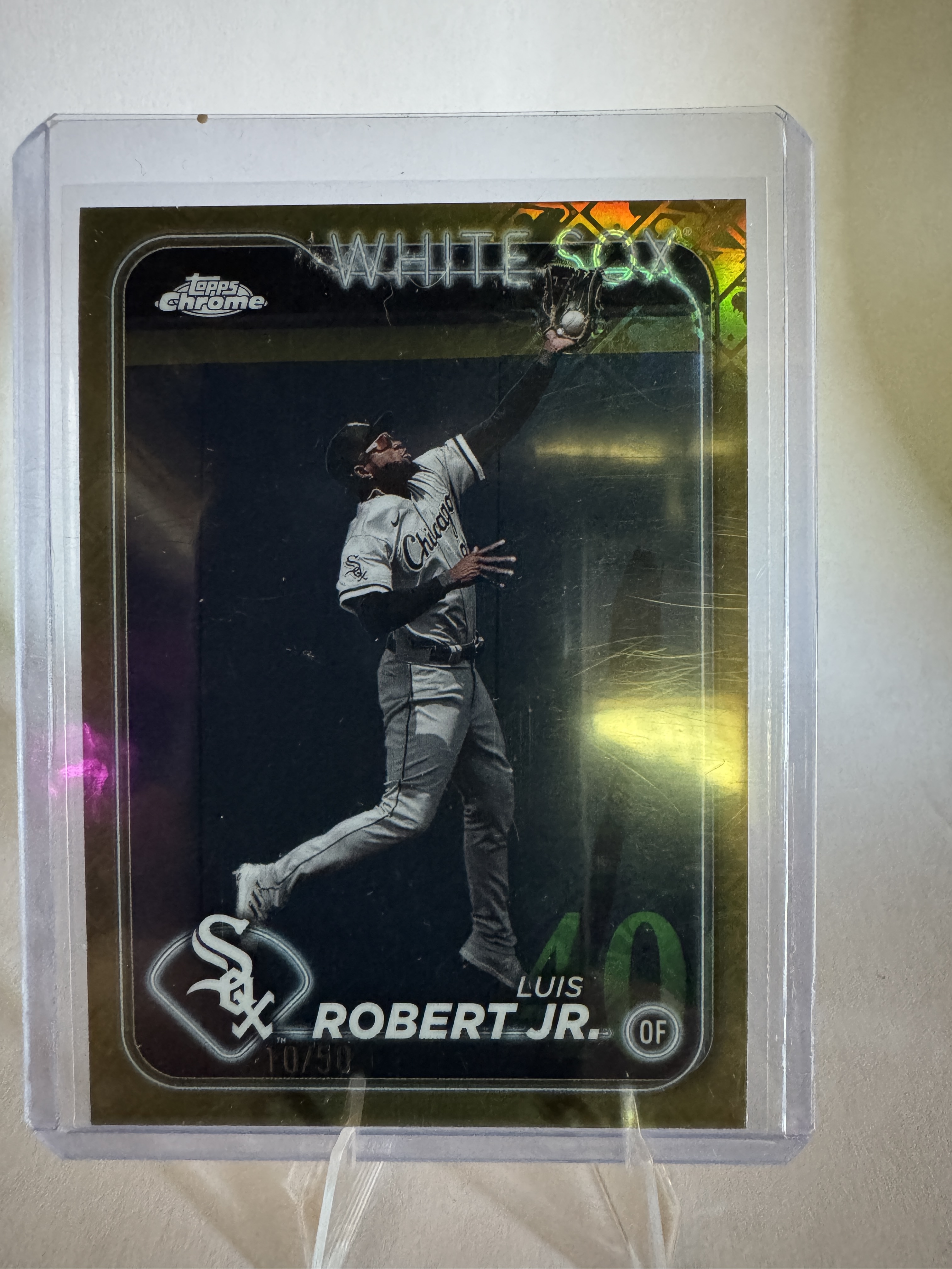2024 Topps Chrome Baseball Logofractor Luis Robert Jr. #86 Gold, Raw, front of the card